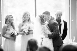 The Gardens at Heather Farm in Walnut Creek - wedding photography by Anna Hogan - photo 36 - ceremony kiss black and white