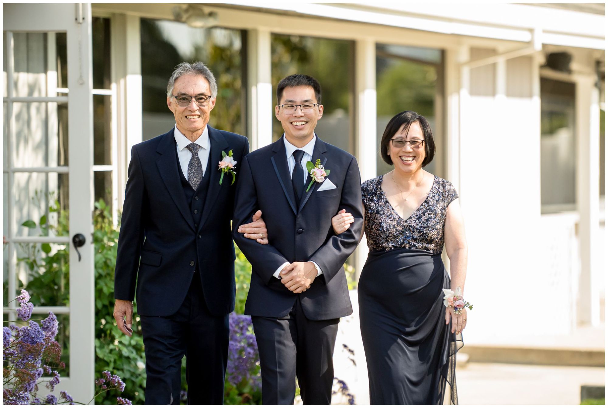 Bride holding bouquet with smile