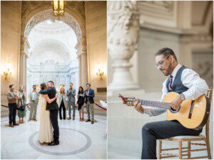 A couple embraces in a grand hall as friends and family look on; next to them, a guitarist in a suit plays music on a classical guitar, seated on a chair in an elegant, ornate setting.